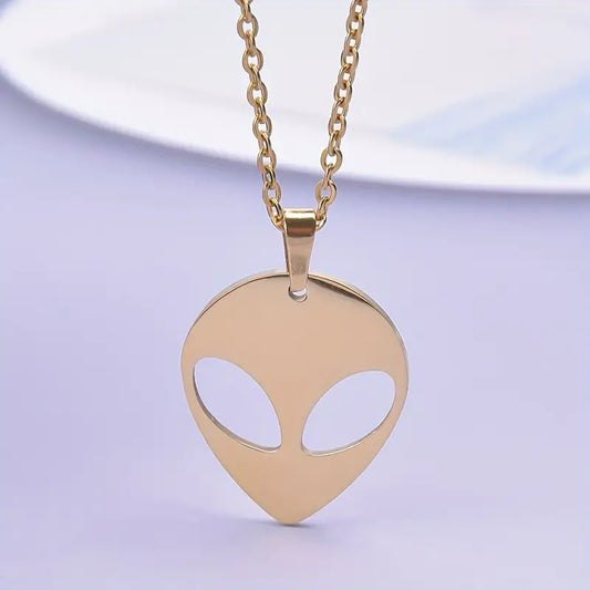 Unearth Extraterrestrial Elegance: Our Stylish Stainless Steel Alien Pendant Necklace - Available in both Silver and Gold Tones Options