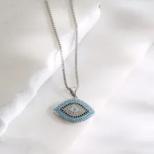 Ward Off Negativity with Our Silver Evil Eye Necklace - A Talisman of Protection