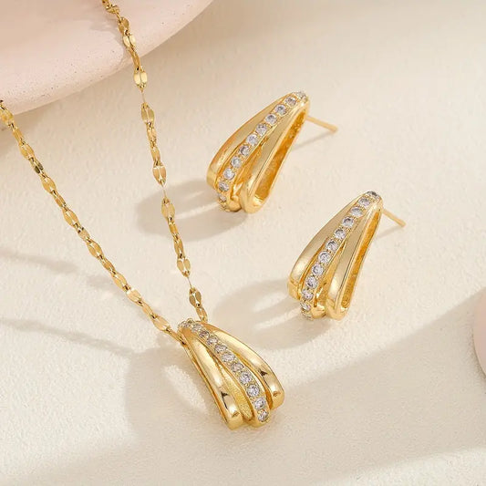 Radiate Timeless Elegance with Our 18KGold CZ Teardrop Earring and Necklace Set