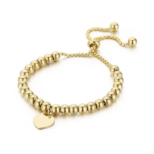 Radiate Love and Elegance with Our Titanium Steel Love Heart Pendant 18K Gold-Plated Bracelet - A Symbol of Timeless Affection and Style, Available in Gold with a Silver Option